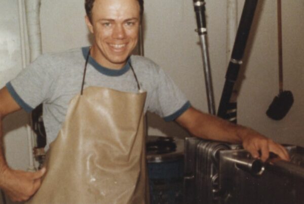 A young Fr. David May working in the cheese house